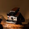 Aparat Polaroid 670-s i-Type Brązowy: Twórz Klasyczne Odbitki w Nowoczesnym Stylu